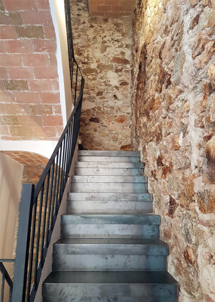 Projecte de reforma d'un habitatge existent entre mitgeres