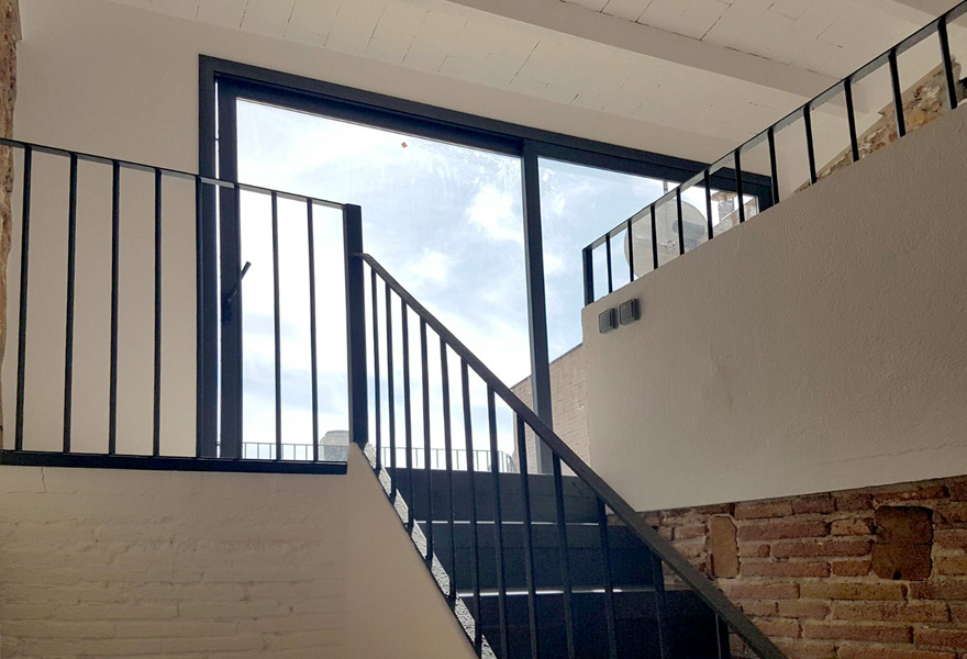 Projecte de reforma d'un habitatge existent entre mitgeres