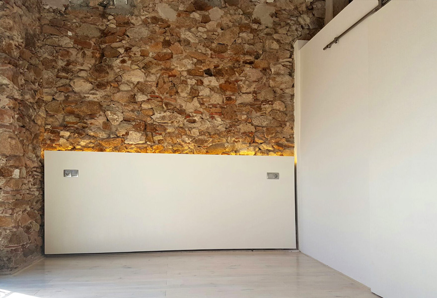 Projecte de reforma d'un habitatge existent entre mitgeres